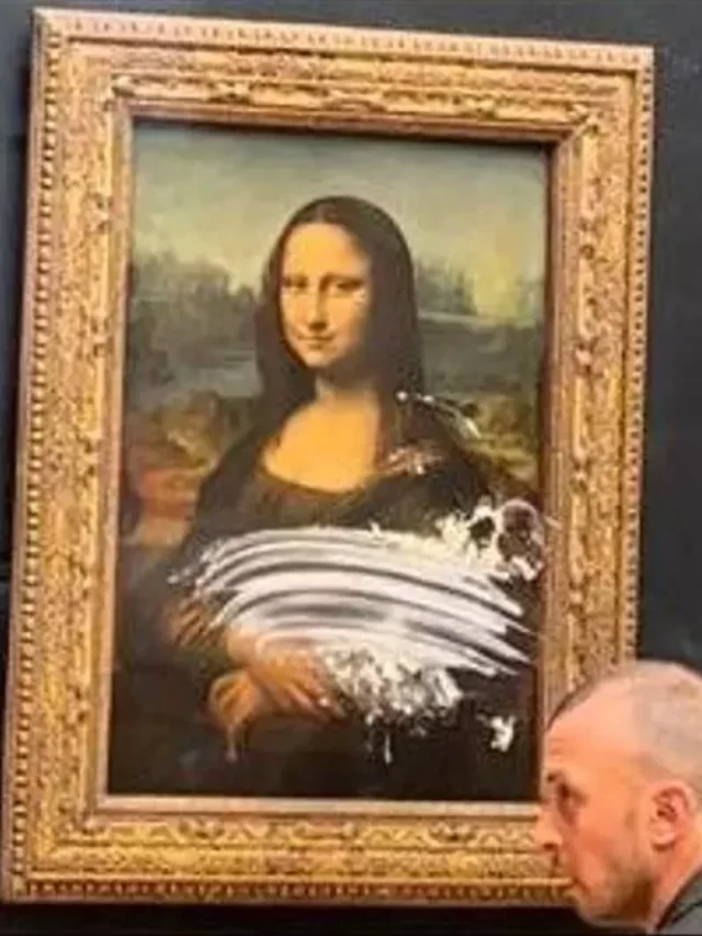An insane young male visitor masked as an old lady in a wheelchair threw a piece of cake at Leonardo Da Vicini's Mona Lisa painting at Paris' Louvre Museum.
